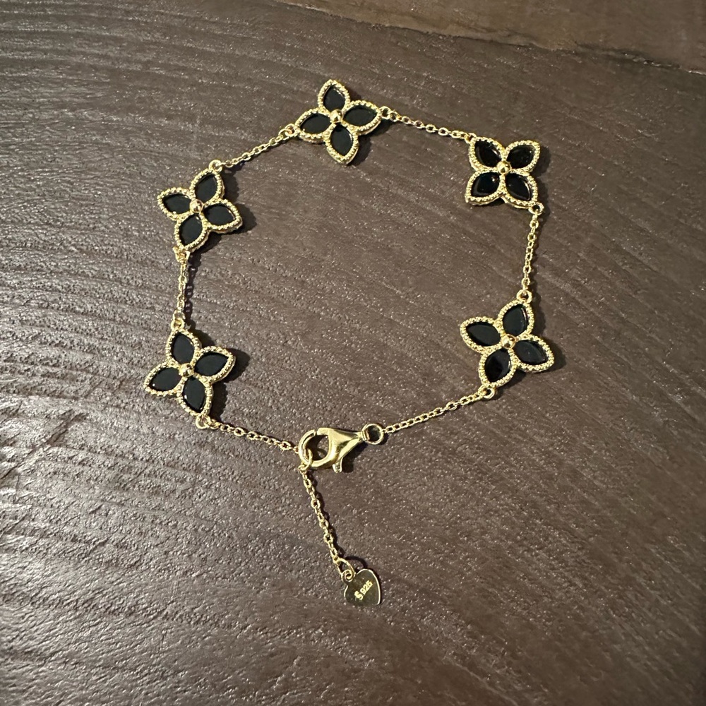 Gold and black color flower bracelet